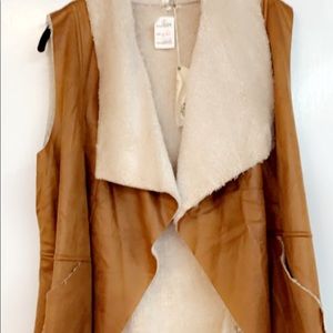 Leather and Sherpa lined vest NWT